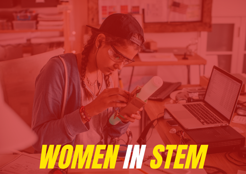 Women in STEM student working on an engineering project at a desk with a laptop, highlighting female participation in science and technology fields.